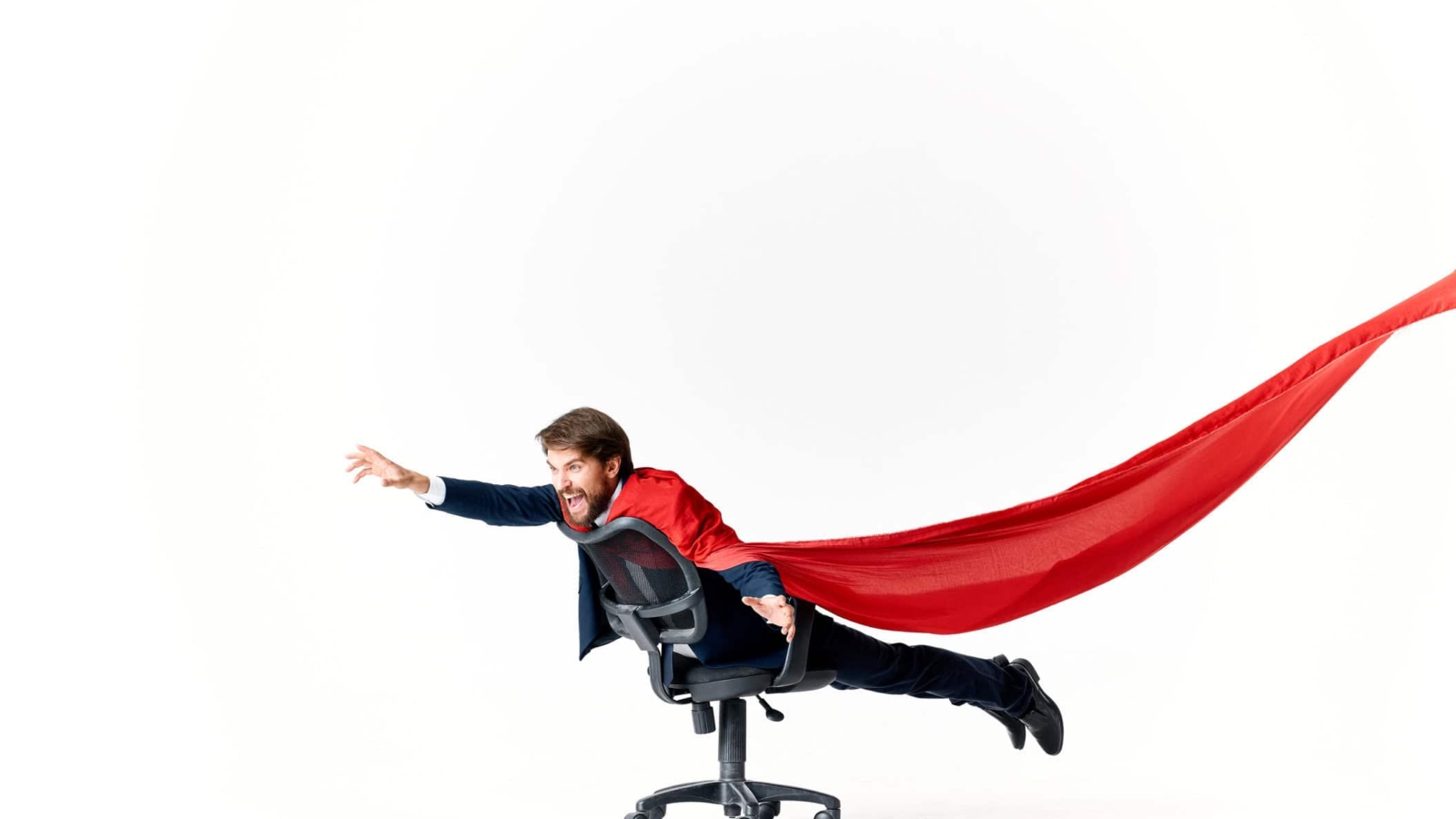 business man in red cloak superman manager office. High quality photo