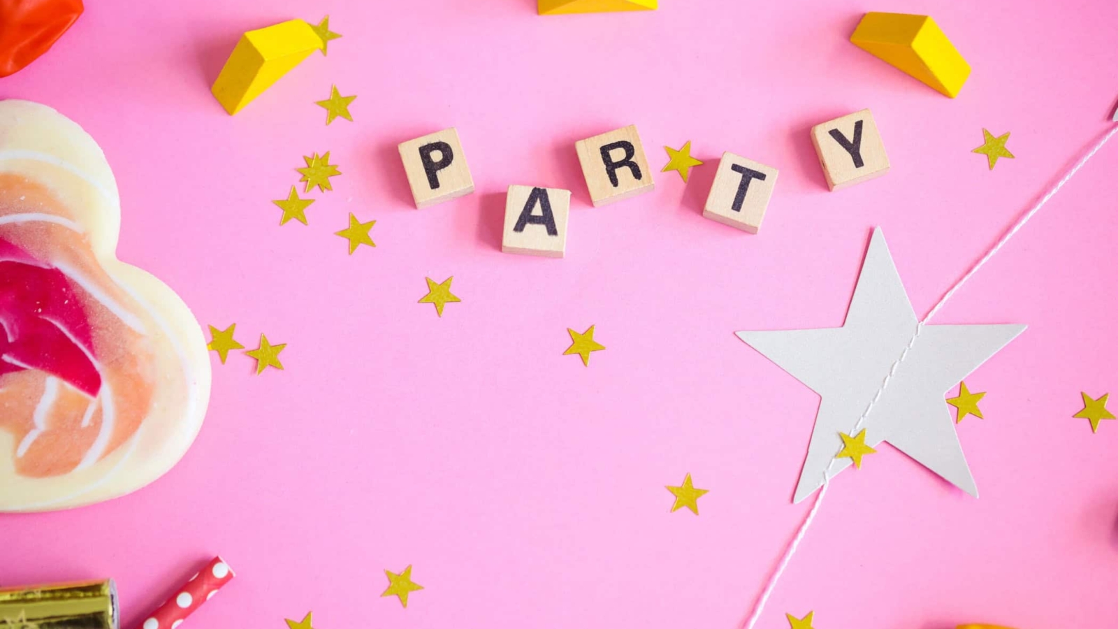 Festive. Party objects on a pink background