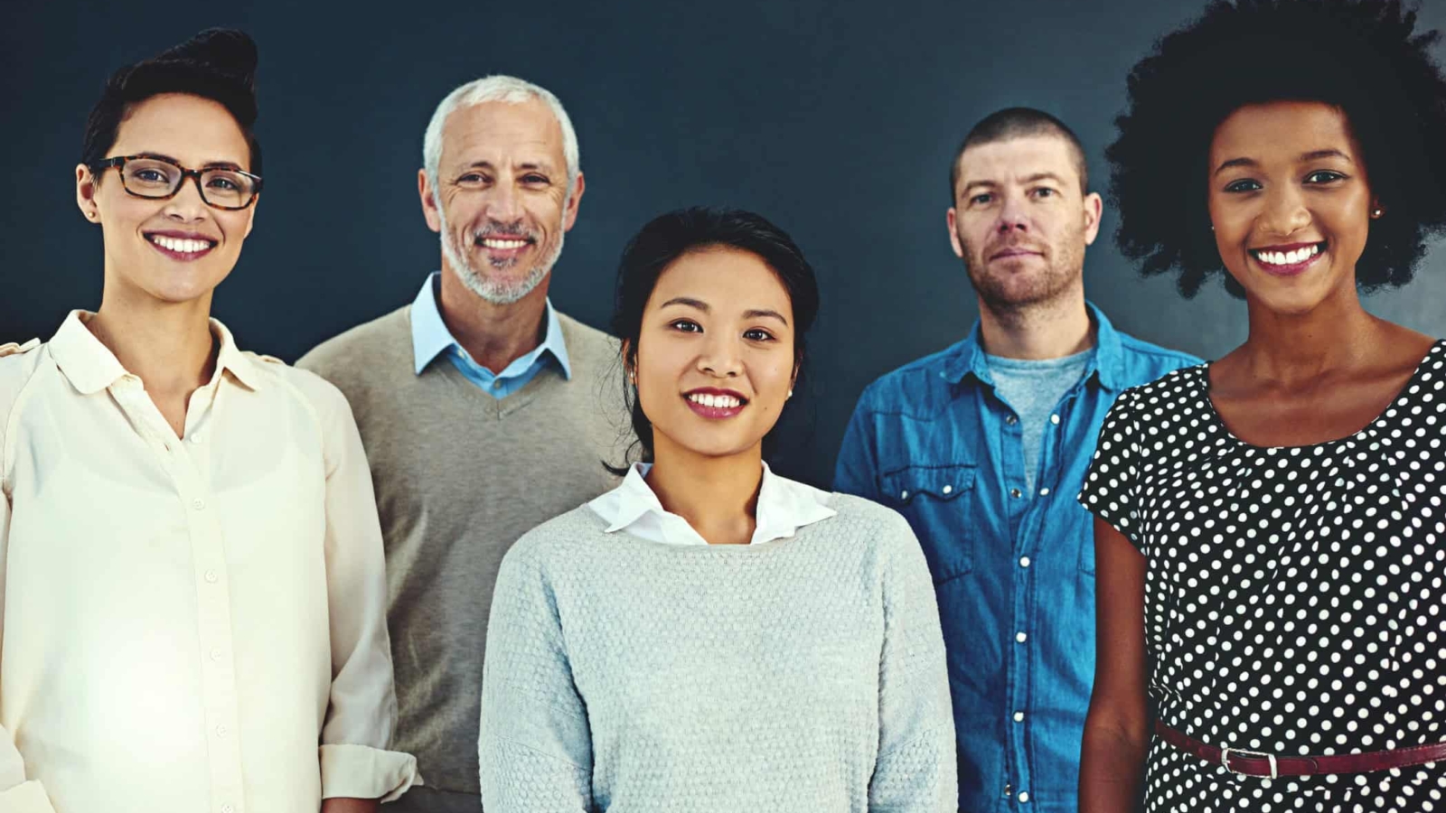 Portrait of a diverse team of creative colleagues posing in the studio.