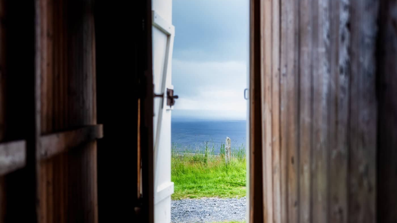 Old historic houses and view on field in Iceland. Natural icelandic background. Start for travelling on Iceland. Travel image